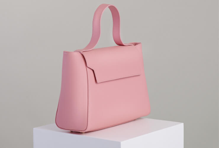 Win a leather handbag & passport case by Aurora London Good